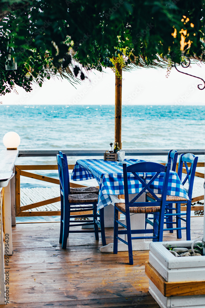 Fototapeta premium view of a street cafe on the seashore