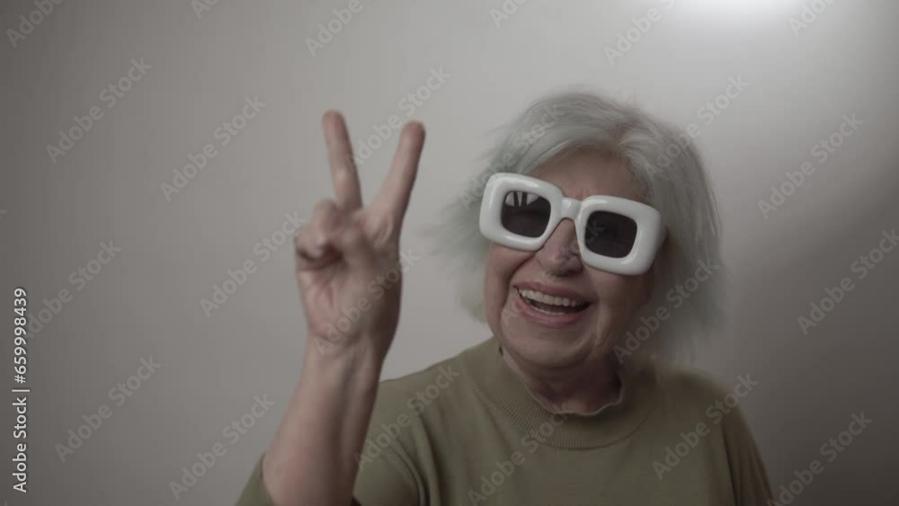 older woman with fashionable sunglasses older woman with fashionable sunglasses