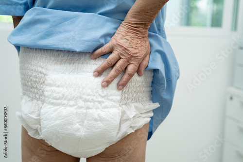 Asian senior woman patient wearing incontinence diaper in hospital  healthy strong medical concept.