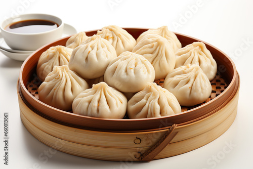 chinese steamed dumplings,chinese dim sum,A wooden platter with dumplings and dipping sauces