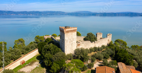 Aerial view on Fortress of the Lion in historical center of Castiglione del Lago, in Umbria, Italy. The castle is now used for events and is located on Lake Trasimeno in the province of Perugia. photo