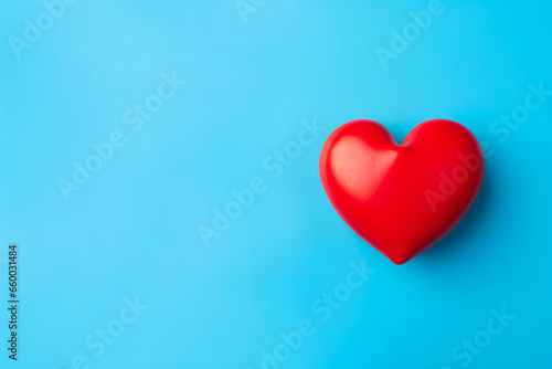 Health Insurance Concept with Red Heart on Blue Background  Flat Lay with Space for Text