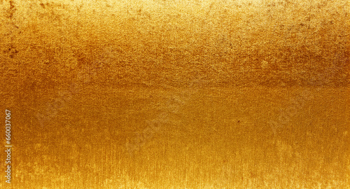 shiny gold fabric wallpaper looks like metal use as background texture for luxury, rich mood and tone. gold glitter texture background sparkling shiny wrapping paper for decoration.