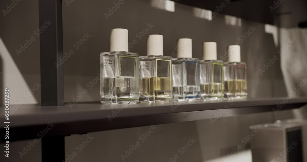 Many interior perfume bottles, Modern room perfume in comfortable apartment. Sale of perfumes in the showroom on the shelves. discount in the store. Fashion perfume. Many interior perfume bottles, Modern room perfume in comfortable apartment. Sale of perfumes in the showroom on the shelves. discount in the store. Fashion perfume.