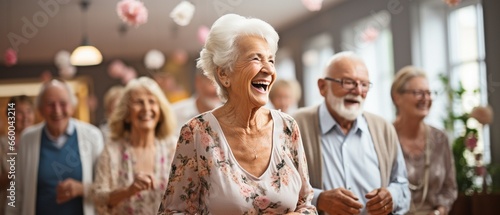 Full-length shot of senior citizens participating in activities and dancing in a retirement home's interior. photo