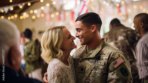 At a suburban family gathering, a military mom surprises her son at his birthday party, his surprised smile capturing the joy of their special reunion. 