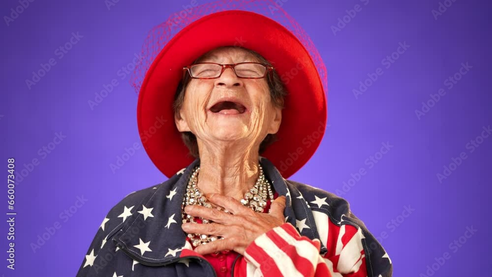 Closeup of laughing, funny, happy, patriotic grandmother mature woman, 80s, wearing US flag jacket isolated on purple background. Concept of youthful old female. Closeup of laughing, funny, happy, patriotic grandmother mature woman, 80s, wearing US flag jacket isolated on purple background. Concept of youthful old female.