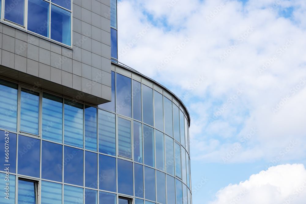 Fototapeta premium Reflection of the sky in glass windows