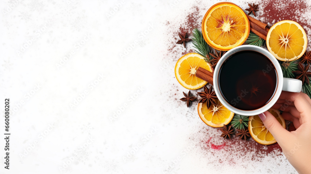 Hands holding a warm cup of mulled beverage for comfort.