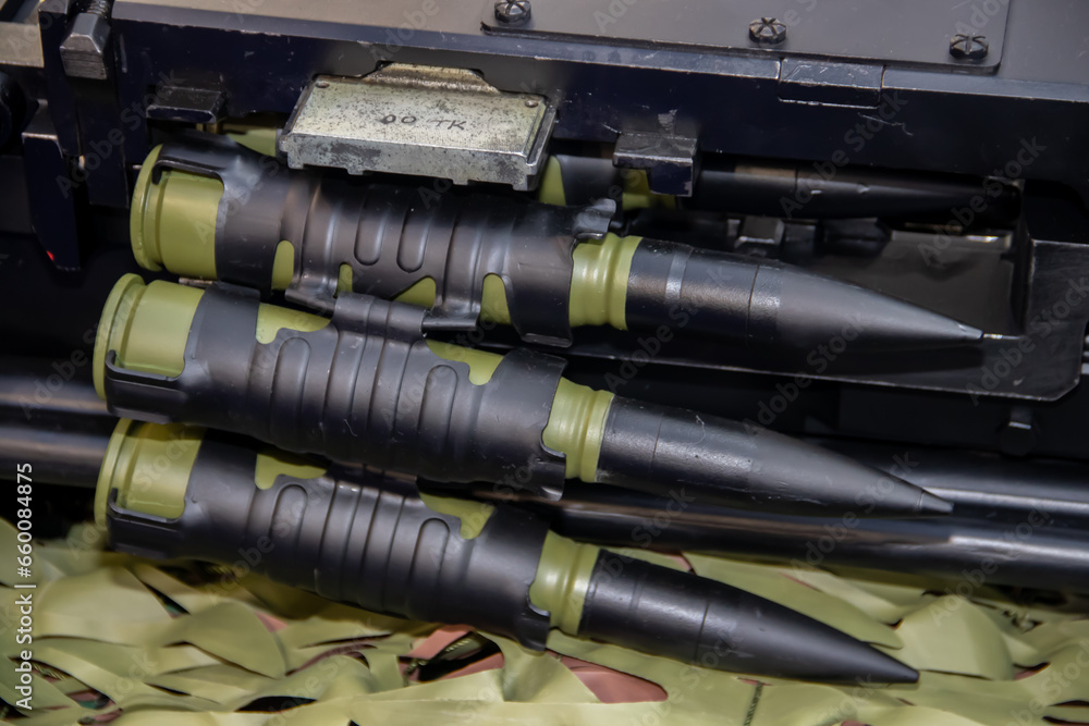 Close up of of bullets 11,8mm caliber in a coaxial machine gun, exposed at Military equipment international exhibition in Belgrade Close up of of bullets 11,8mm caliber in a coaxial machine gun, exposed at Military equipment international exhibition in Belgrade