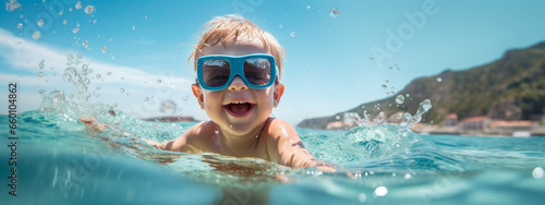 A child in sunglasses swims in the sea. Generative AI. photo
