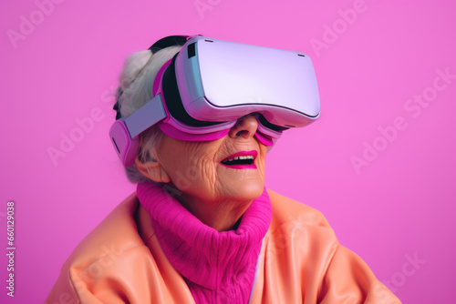 Elderly surprised woman wearing modern VR goggles on pink background, 90s style.