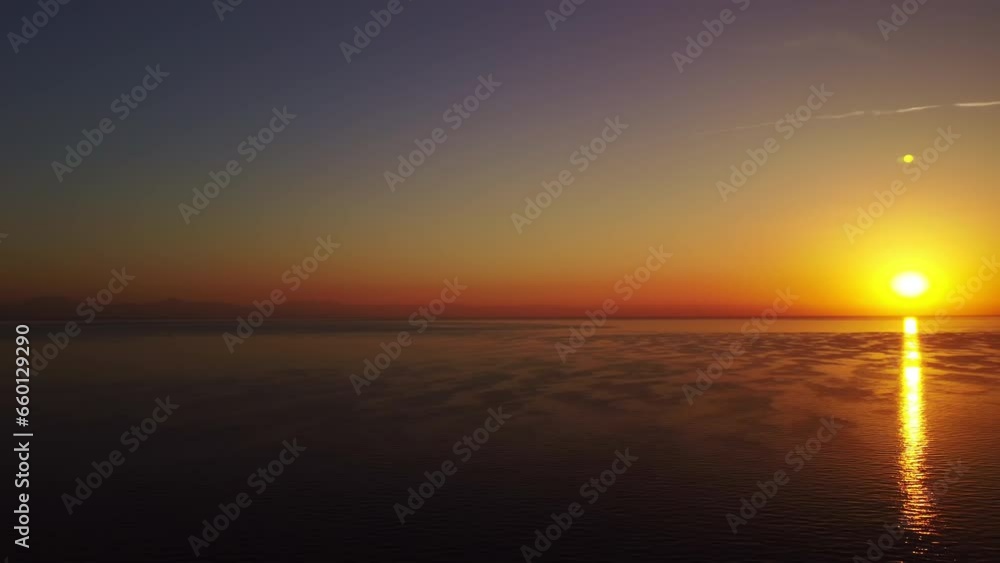 Aerial view of colorful sunrise over the sea, Kemer, Turkish beach resort city. Beautiful Mediterranean Sea, morning fog. Concept of travel Aerial view of colorful sunrise over the sea, Kemer, Turkish beach resort city. Beautiful Mediterranean Sea, morning fog. Concept of travel