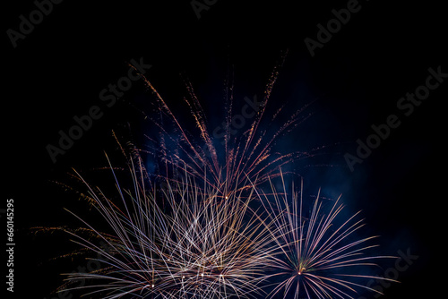 A fireworks display against the night sky