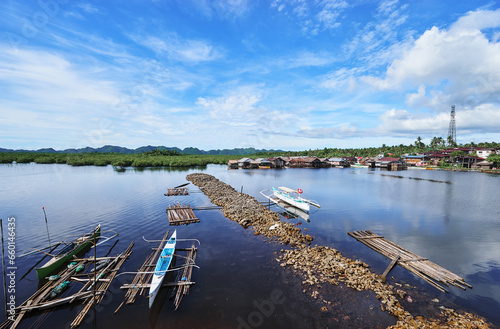 Traditional fishing boats harbour at Siargao, Philippines.