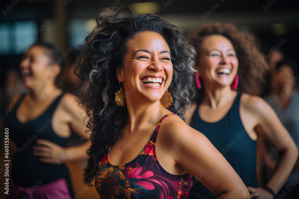 Middle-aged women enjoying a joyful dance class, candidly expressing their active lifestyle through Zumba with friends - obrazy, fototapety, plakaty 