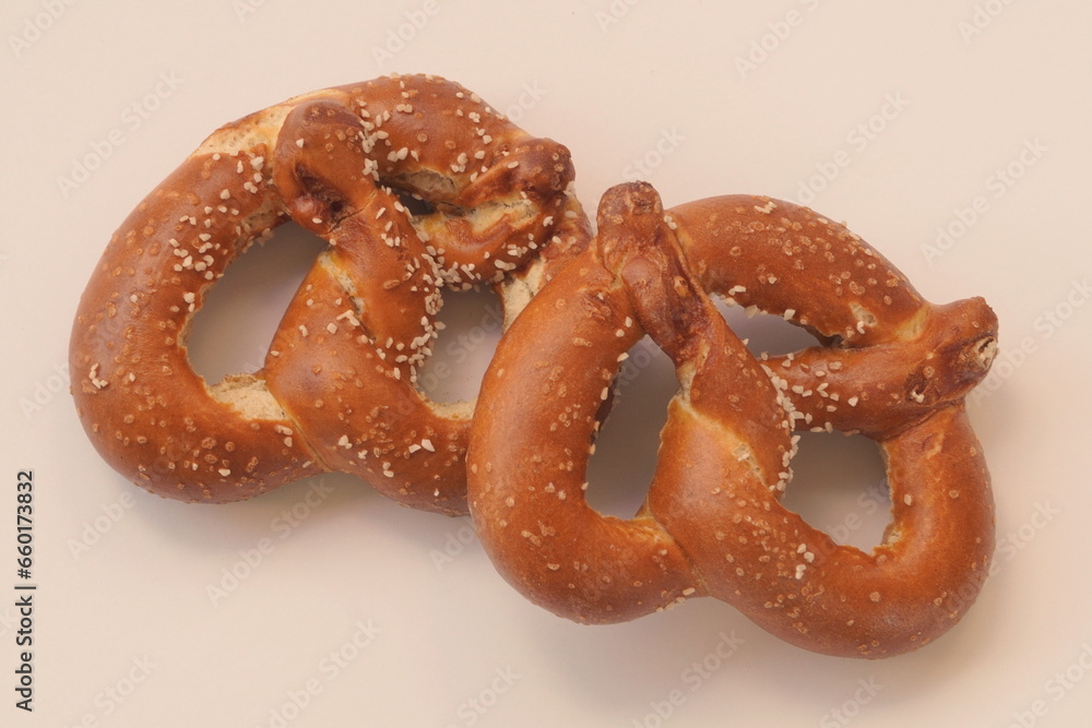 Two Salted Pretzels on White with Room for Text Two Salted Pretzels on White with Room for Text
