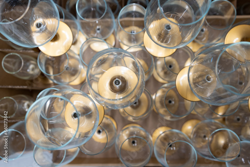 A lot of empty wine glasses. Top view of the pyramid of wine glasses.