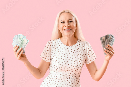 Mature woman with dollar ba...
