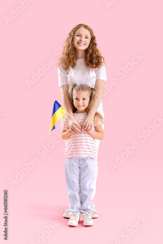 Happy little girl and her m...
