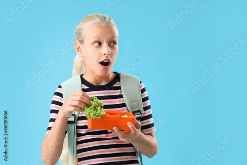 Shocked girl with backpack ...