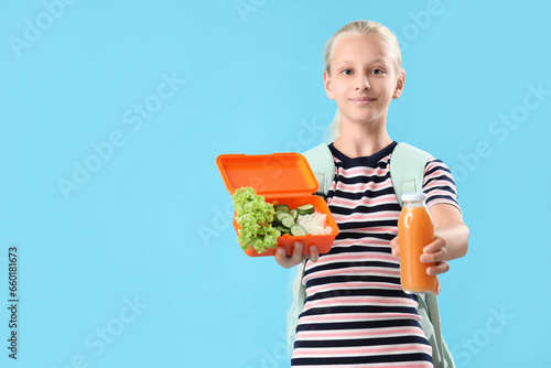 Girl with backpack, lunchbo...
