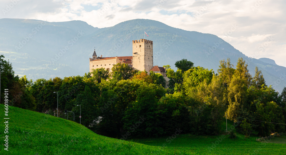View of Bruneck Castle, situated on the hill over the old town, in Val Pusteria, Italy
