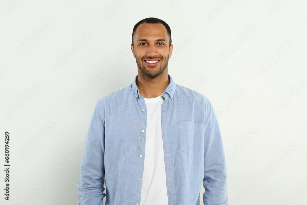 Portrait of handsome young man on white background Portrait of handsome young man on white background