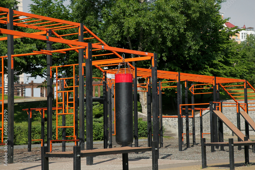 Empty outdoor gym with exercise equipment in park Empty outdoor gym with exercise equipment in park