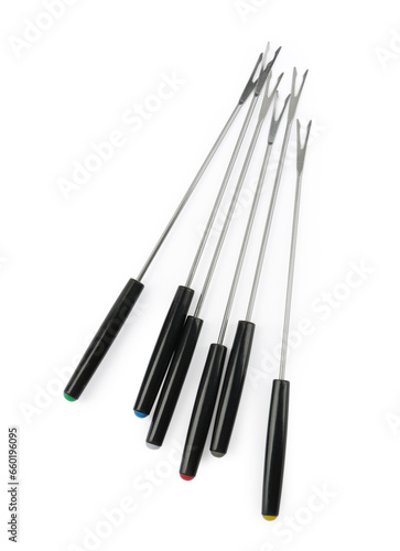 Set of fondue forks isolated on white, top view. Kitchen equipment