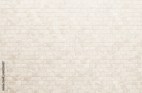 Empty background of wide cream brick wall texture. Beige old brown brick wall concrete or stone textured, wallpaper limestone abstract flooring. Grid uneven interior rock. Home decor design backdrop.