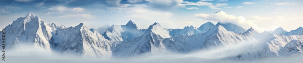 A breathtaking landscape painting capturing the majestic beauty of mountains enveloped in clouds