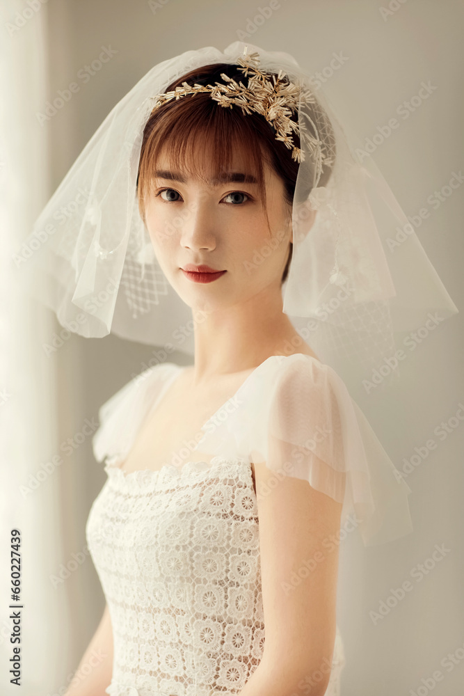 Asian bride wearing white wedding dress Asian bride wearing white wedding dress