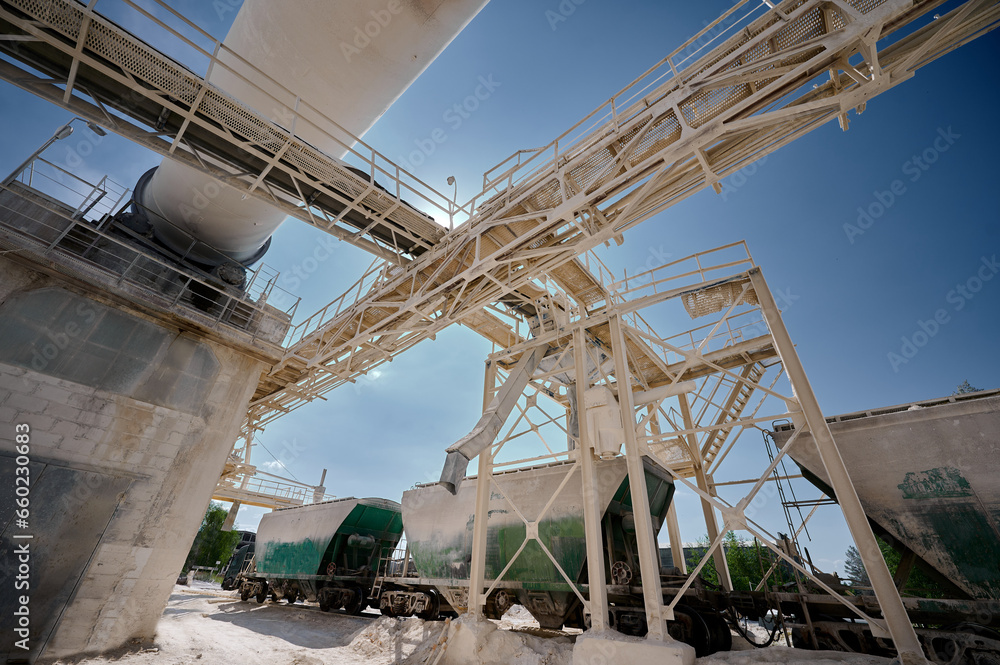 Conveyor rack for loading railway cars at silica plant