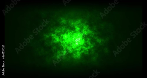 Abstract green glowing light inside cloud. Video footage background.