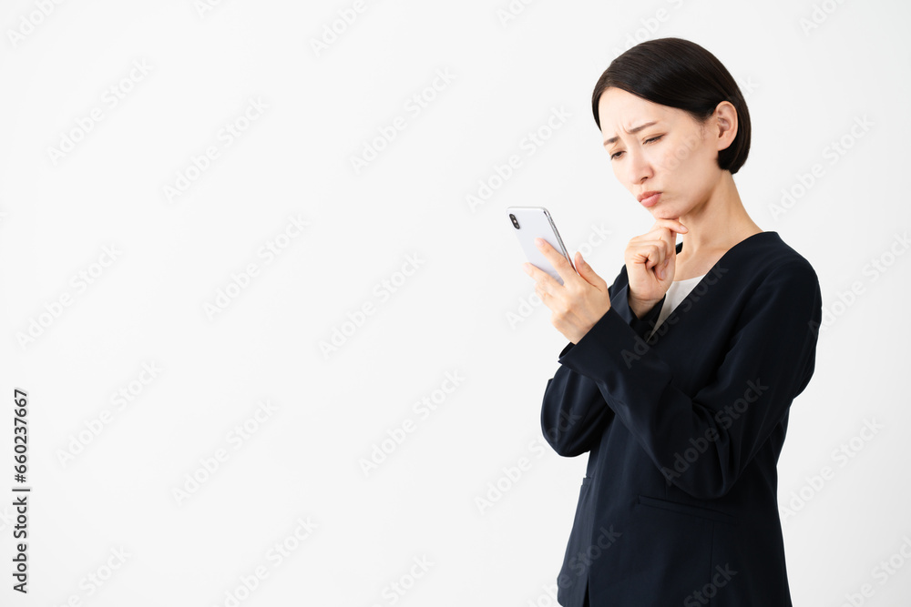 Fototapeta premium ビジネススーツを着ている若い女性 ビジネスイメージ