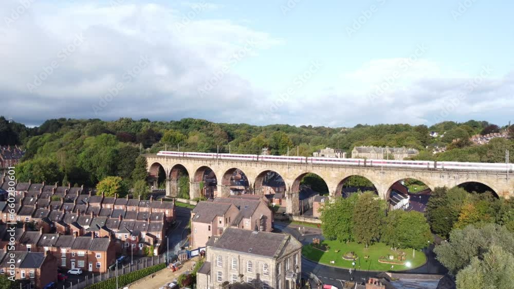 Train crossing viaduct in Durham Town centre - Aerial Drone 4K HD Train crossing viaduct in Durham Town centre - Aerial Drone 4K HD