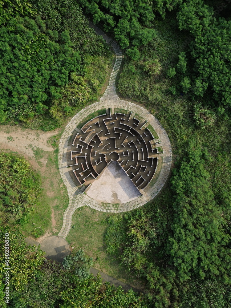Fototapeta premium Aerial view of Laomei maze in Taiwan. Top down view by drone in Shimen district, New Taipei City, North Taiwan. A famous attraction nearby Laomei green reef.