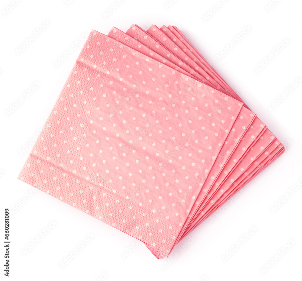 Stack of pink dotted paper napkins on white background Stack of pink dotted paper napkins on white background