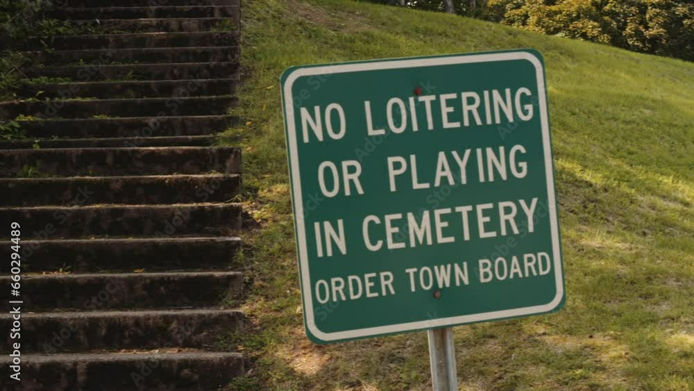 No loitering sign near a cemetery near Downtown Palmyra New York. Also the location of the first publication of the Book of Mormon. Early church history. 60fps No loitering sign near a cemetery near Downtown Palmyra New York. Also the location of the first publication of the Book of Mormon. Early church history. 60fps