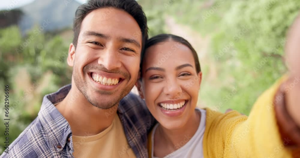 Couple, kiss and selfie in nature for hiking with love or adventure, happy and fun together. Portrait, smile and travel influencer people in a forest for social media profile picture, blog or podcast Couple, kiss and selfie in nature for hiking with love or adventure, happy and fun together. Portrait, smile and travel influencer people in a forest for social media profile picture, blog or podcast