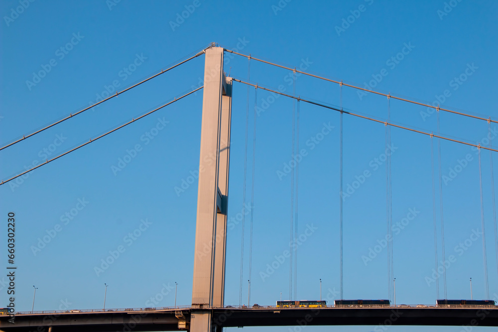 Istanbul Bosphorus Bridge with cars passing over it on a sunny day. Istanbul Bosphorus Bridge with cars passing over it on a sunny day.