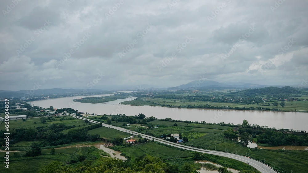 Aerial view of Golden Triangle, Thailand, the confluence of Ruak river and the Mekong river, where converge the borders of Thailand, Laos and Myanmar. Aerial view of Golden Triangle, Thailand, the confluence of Ruak river and the Mekong river, where converge the borders of Thailand, Laos and Myanmar.