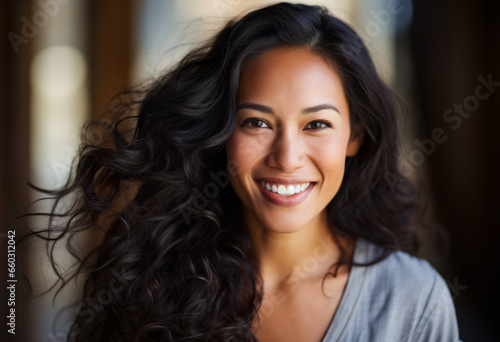 Portrait of a smiling woman isolated from the background © JuanM