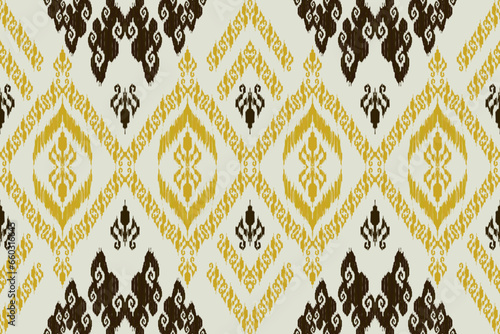 Ikat paisley embroidery on the fabric in Indonesia,India and asian countries.geometric ethnic oriental seamless pattern.Aztec style. illustration.design for texture,fabric,clothing,wrapping,carpet.