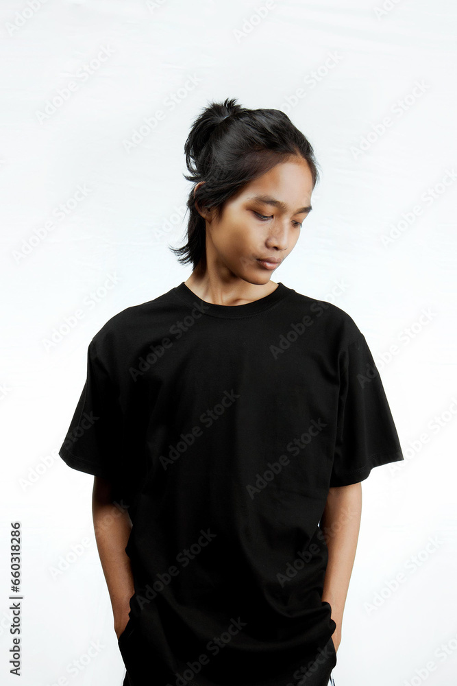 Asian men. Young Asian man close up shot isolated on white. Young Asian man wearing a plain black t-shirt isolated on a white background. Asian men. Young Asian man close up shot isolated on white. Young Asian man wearing a plain black t-shirt isolated on a white background.