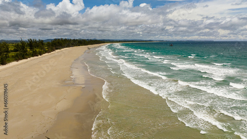 Aerial view of tropical landscape with a beautiful beach. Kimihang beach. Borneo, Sabah, Malaysia.