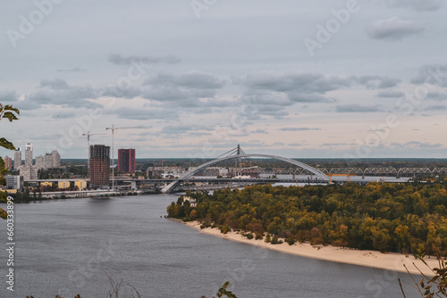 a view of Podilsk Voskresensky Bridge and the Dnipro River photo