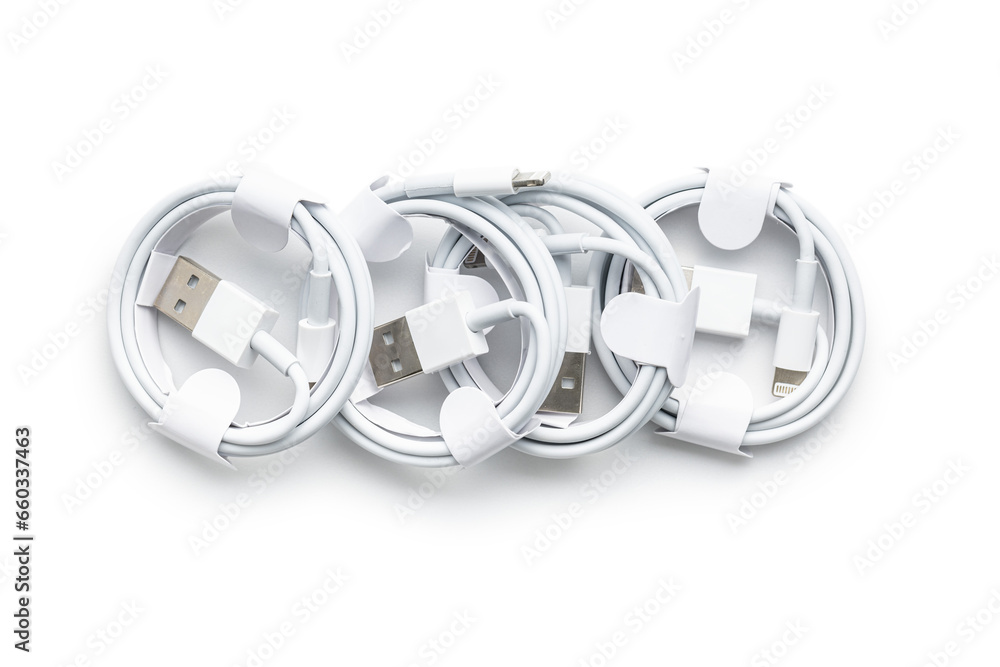 White usb charging cables isolated on white background. White usb charging cables isolated on white background.
