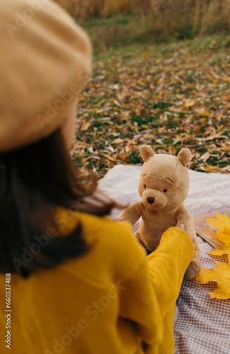 Canvas Print Child with teddy bear. Autumn vibe
